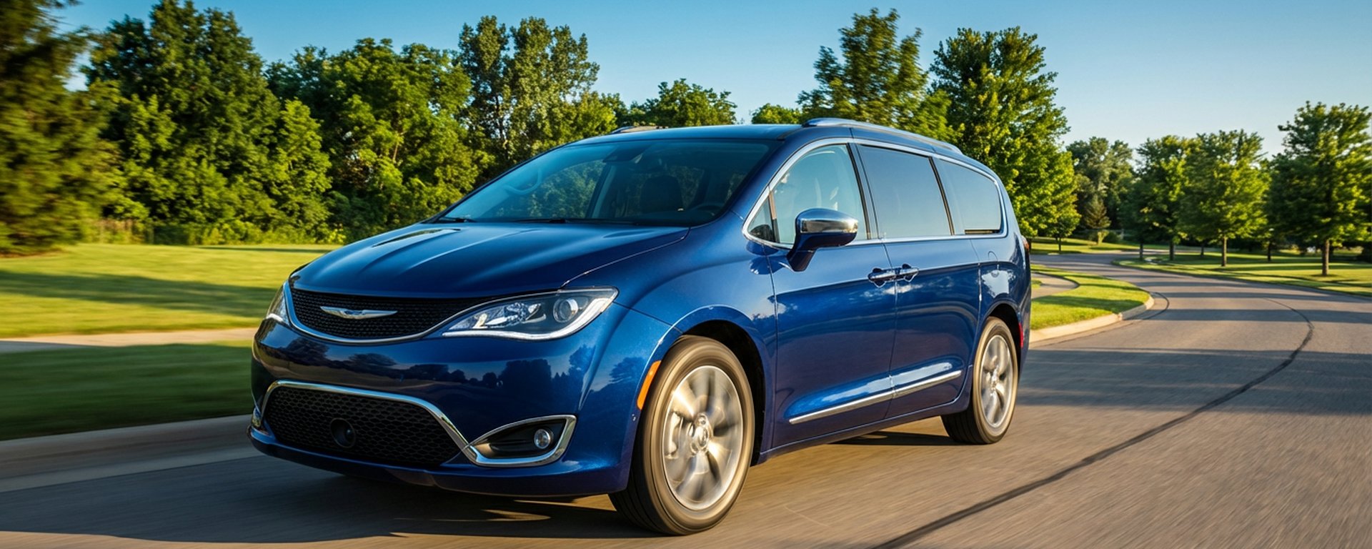 Transit Professionals blue Chrysler Pacifica minivan driving through Western New York